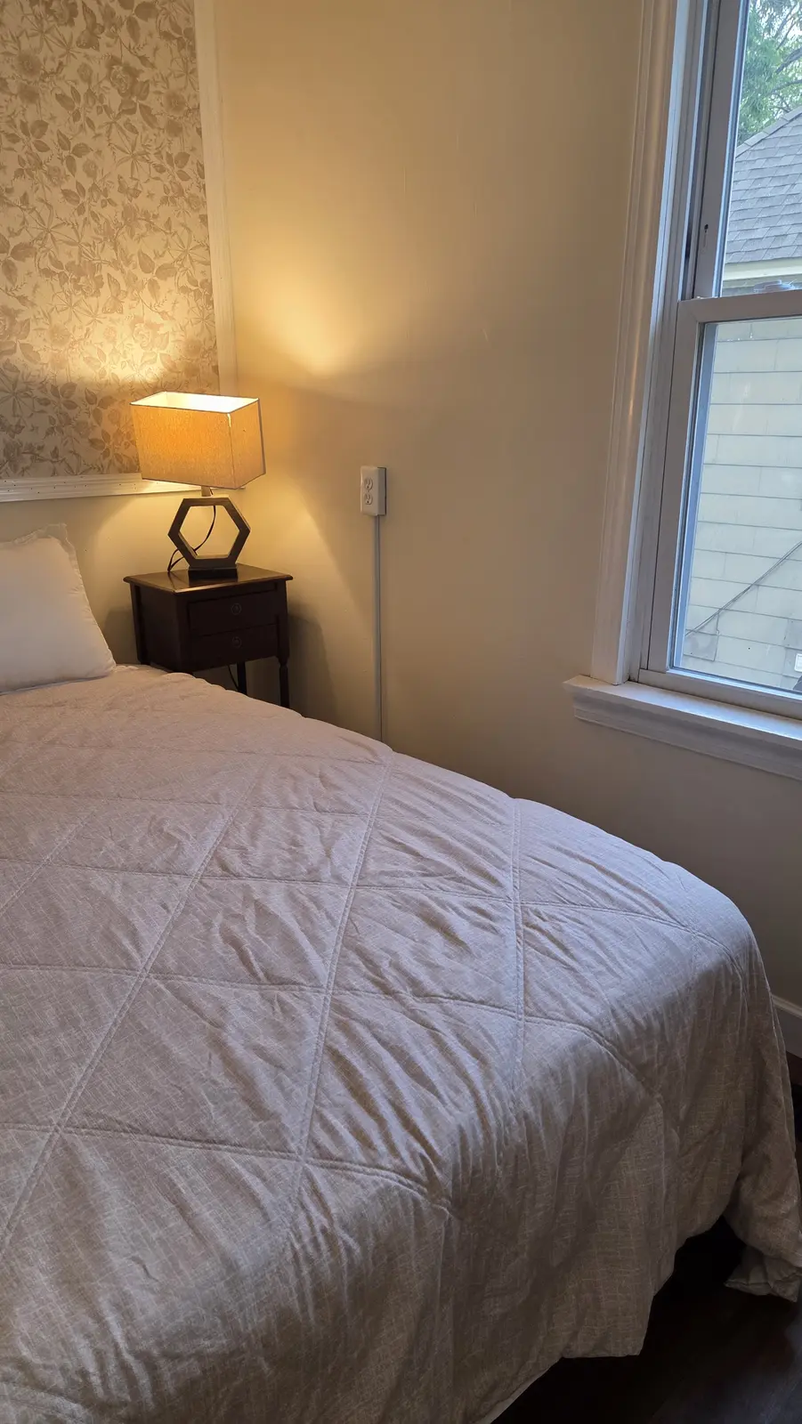 Ugly Kitchen bedroom with window and bedside table