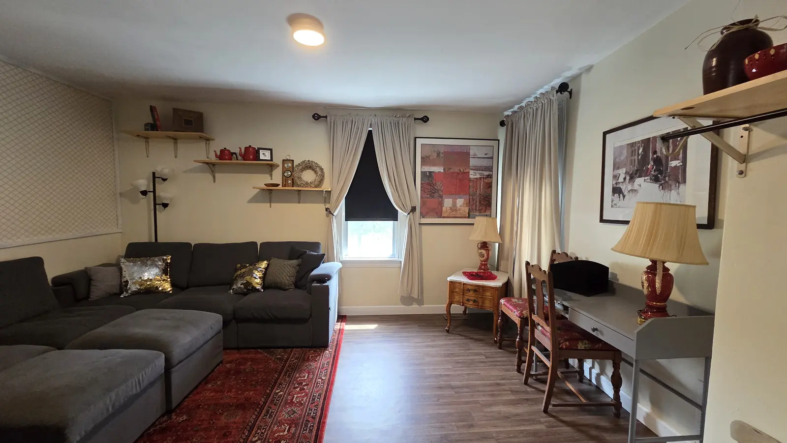 Ugly Kitchen living room with shelving and desk