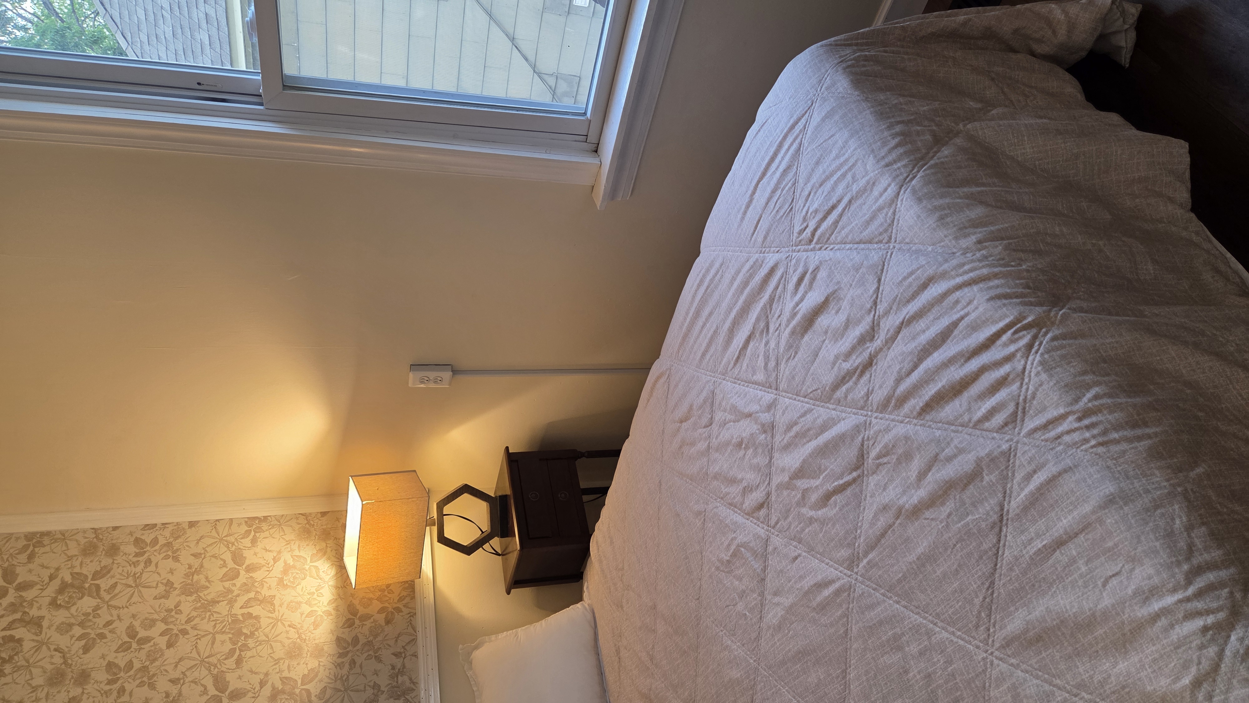 Ugly Kitchen bedroom with window and bedside table