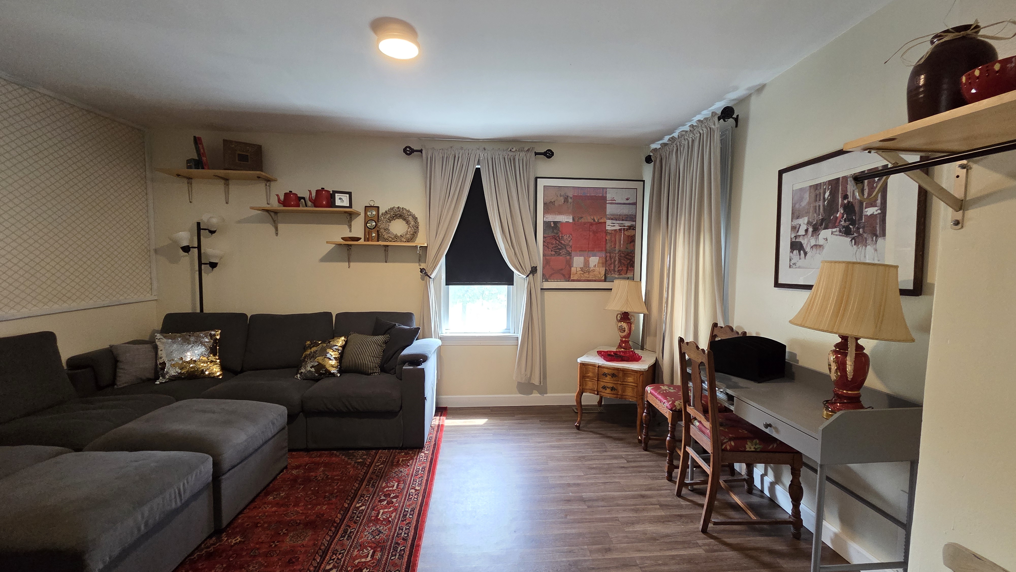 Ugly Kitchen living room with shelving and desk